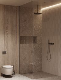 Glass shower with strong visual axis and rainfall head